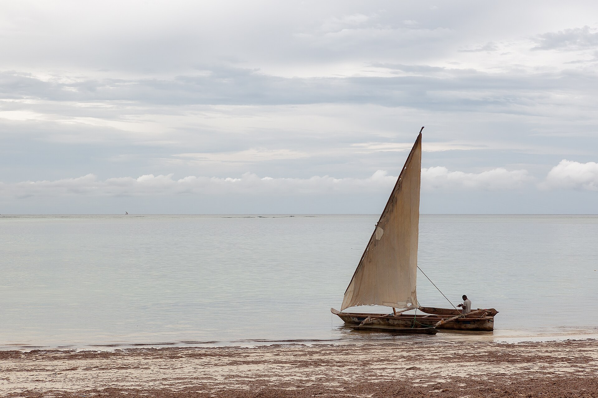 Traditional dhow boat on a Zanzibar beach