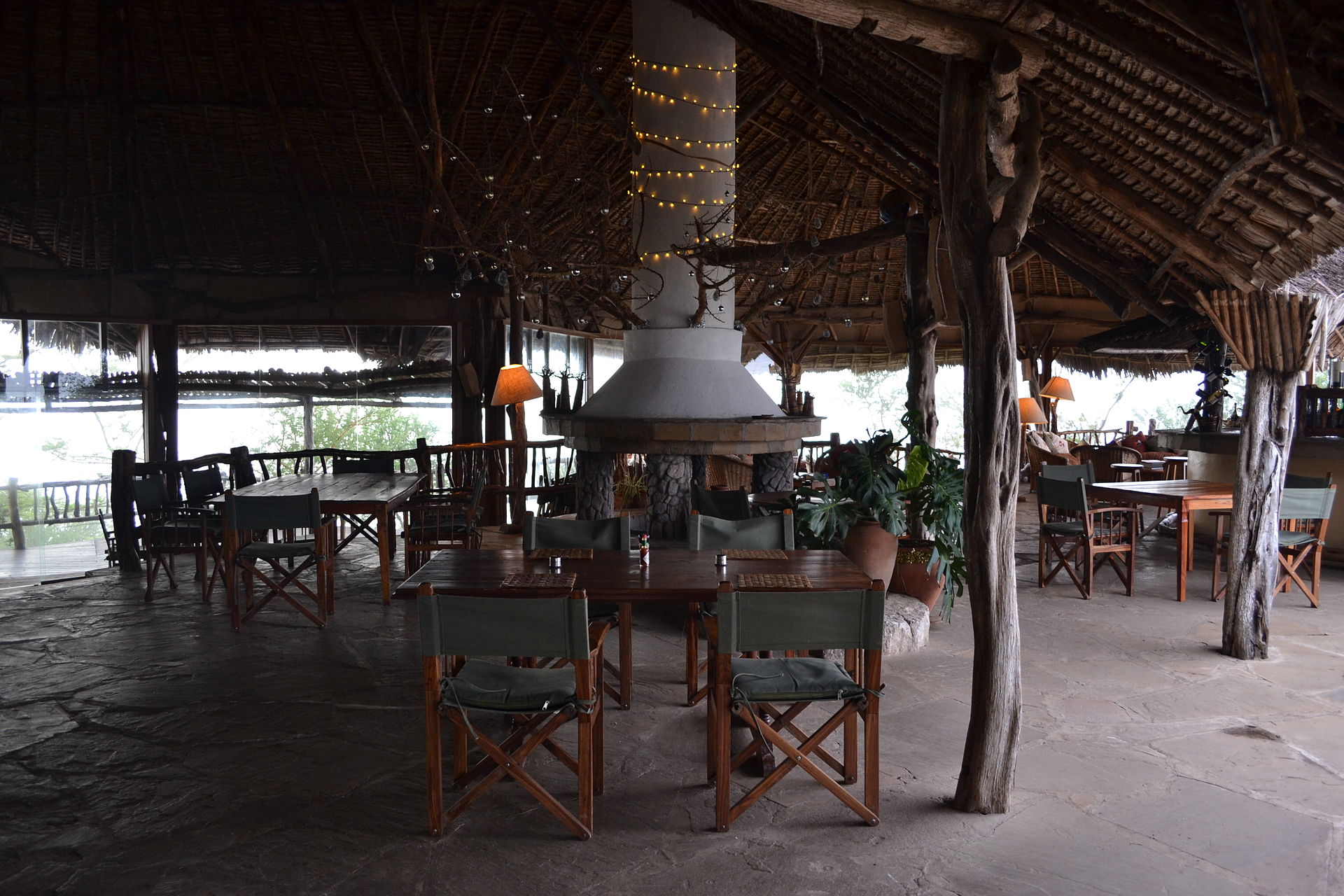 Safari lodge restaurant overlooking a Kenyan wildlife sanctuary